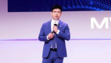 Arthur Wang delivering a keynote speech